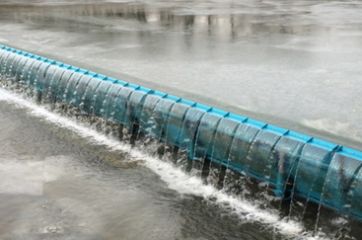 Comparison of Operation Parameters of Hydraulic Elevator Dam and Steel dam gate